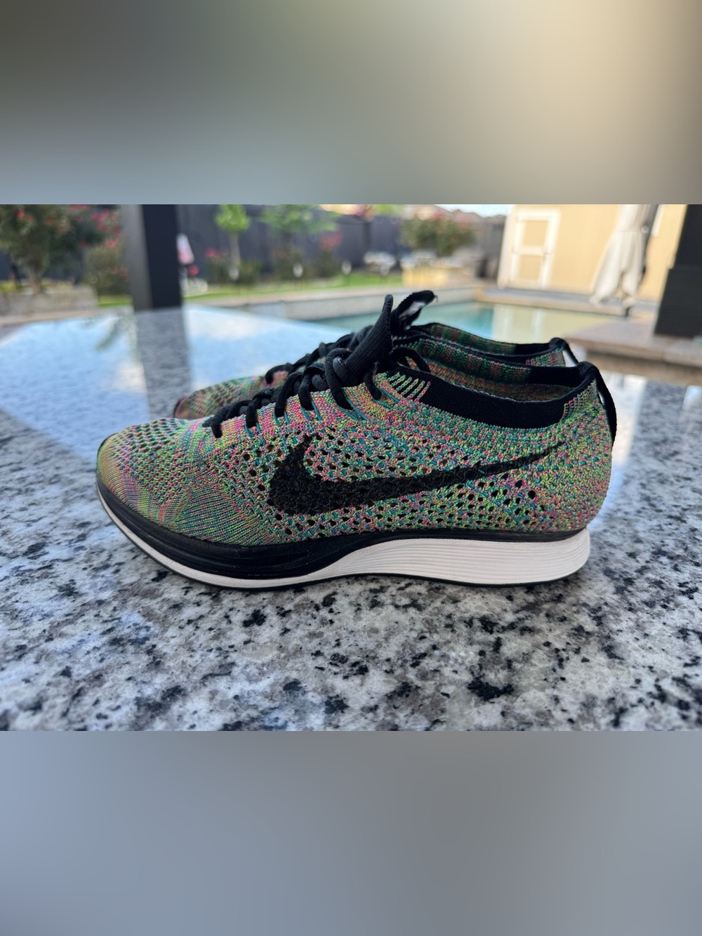 Nike Multicolor Flyknit Running Shoes with Black Swoosh